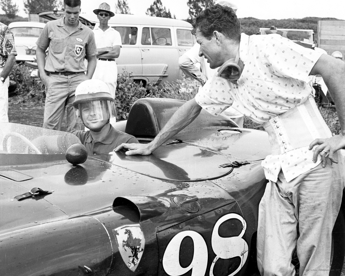Phil Hill behind the wheel of the 1955 Ferrari 410 Sport Spider by Scaglietti chatting with Shelby at Hawaii Speed Week